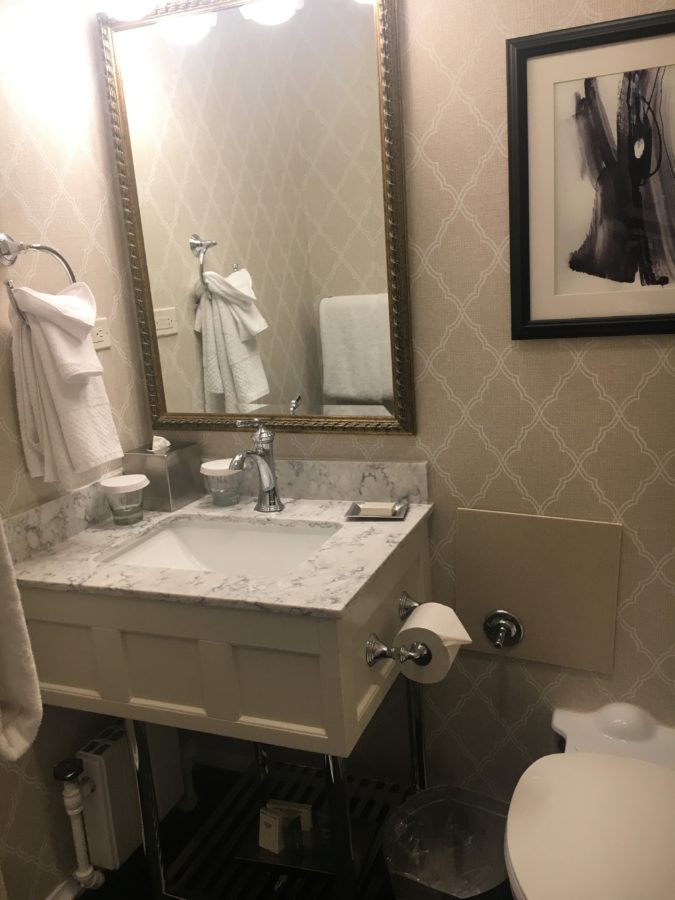 Bathroom with its small sink and no counter space