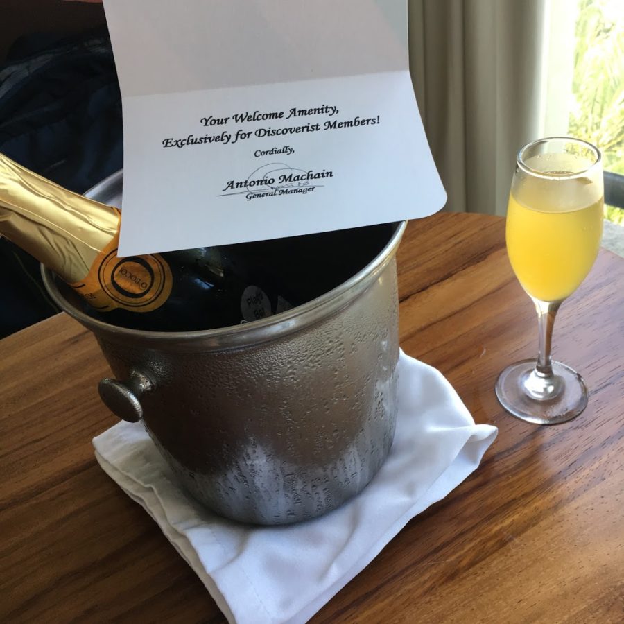 a champagne in a bucket with a paper on it