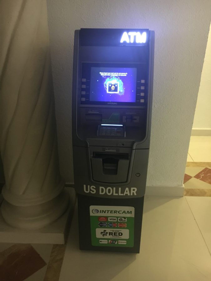 There are ATMS with US dollars and Mexican pesos