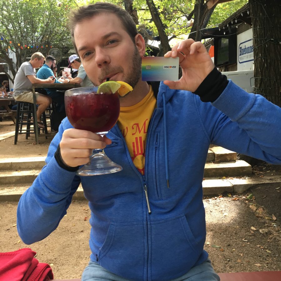 a man drinking a drink