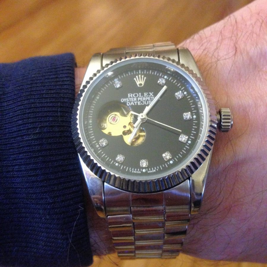 a wrist with a watch on it