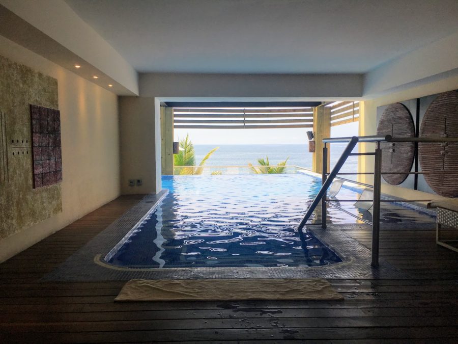 a pool with a wood floor and a wood floor