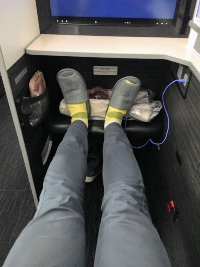 a person's legs in a desk