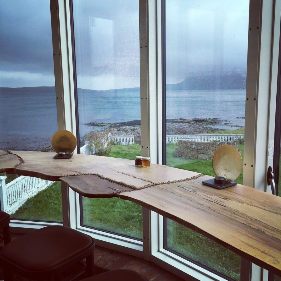 a table with a view of the ocean