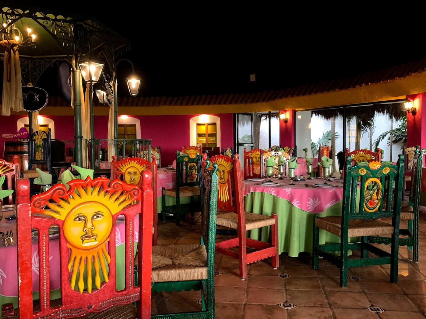 a colorful chairs and table set up in a restaurant