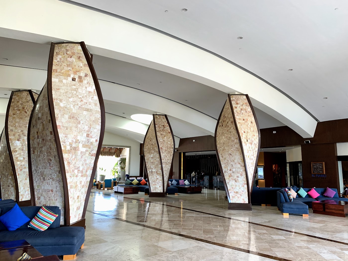 a large stone columns in a lobby