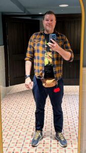 a man taking a selfie in a mirror